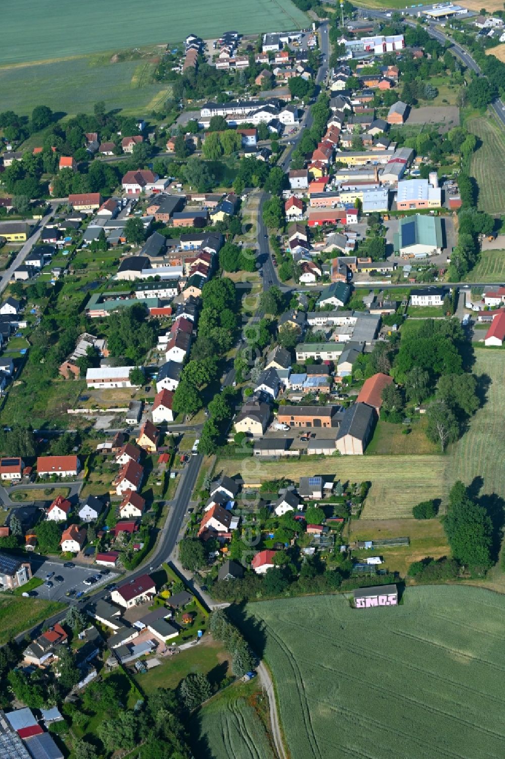 Aerial photograph Lindenberg - Street - road guidance of Karl-Marx-Strasse in Lindenberg in the state Brandenburg, Germany