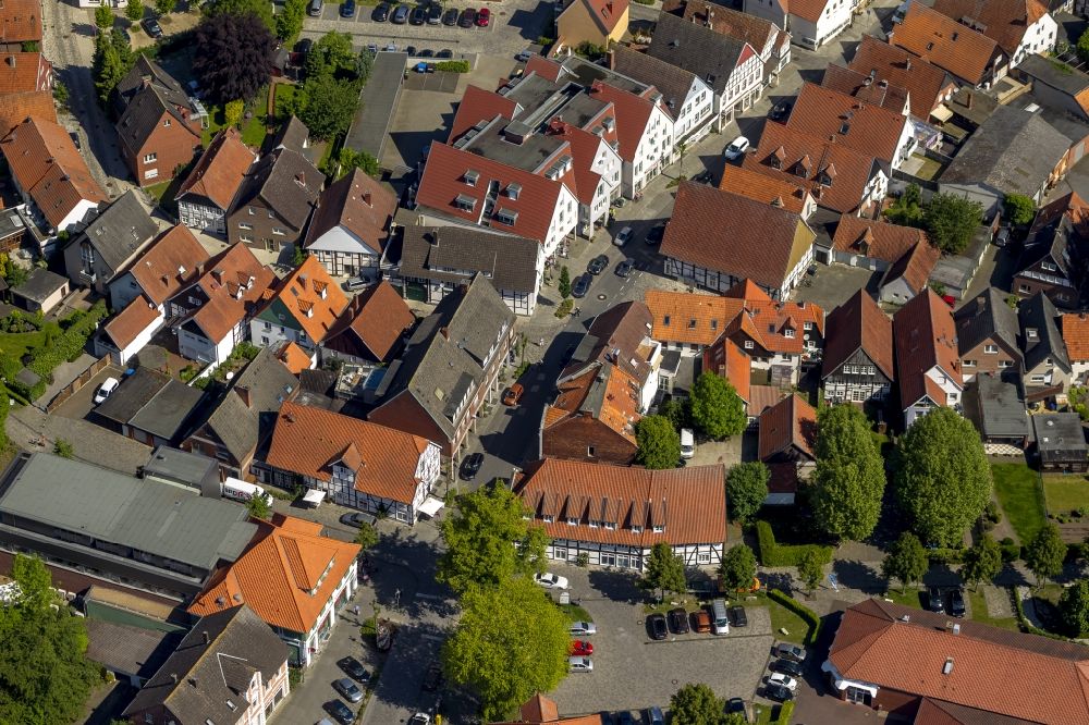 Aerial photograph Rietberg - View of the course of the Rathausstrasse through a residential area with half-timber houses in Rietberg in the state North Rhine-Westphalia