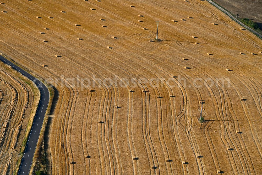Aerial image Henfstädt - Straw bale landscape in a field on the outskirts in Henfstaedt in the state Thuringia, Germany