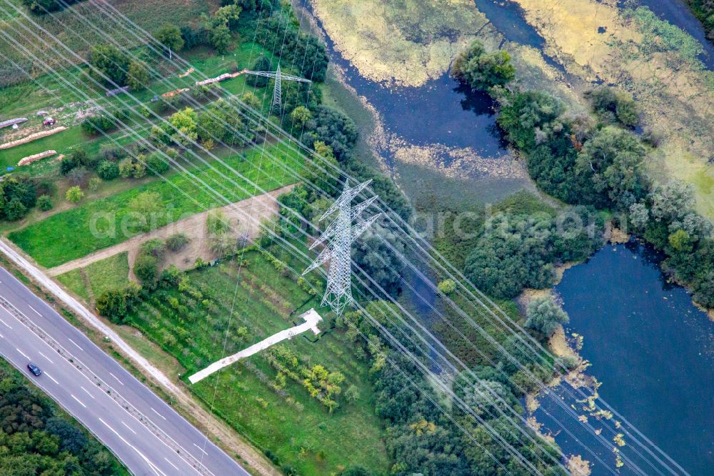 Aerial image Wörth am Rhein - Current route and pylons of crossing high power lines on street B9 in Woerth am Rhein in the state Rhineland-Palatinate, Germany
