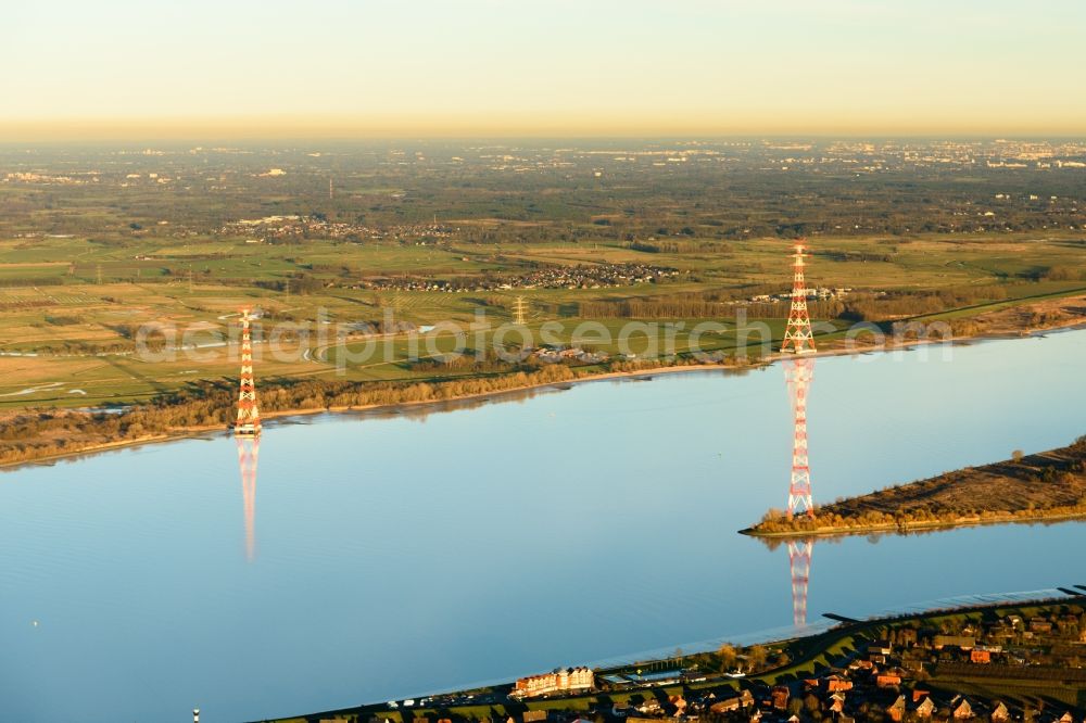 Aerial image Hollern-Twielenfleth - Power tower-construction of a road and Interconnector above the river Elbe in Hollern-Twielenfleth in the state Niedersachsen, Germany