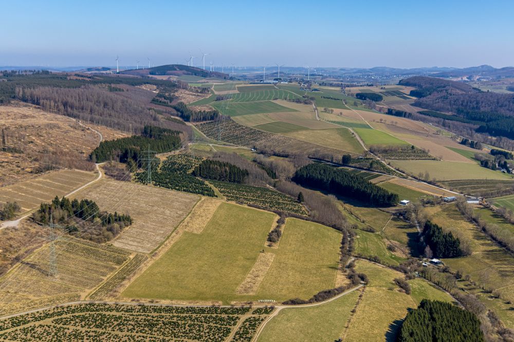 Olsberg from the bird's eye view: Structures on agricultural fields along the power pole - route in Olsberg at Sauerland in the state North Rhine-Westphalia, Germany