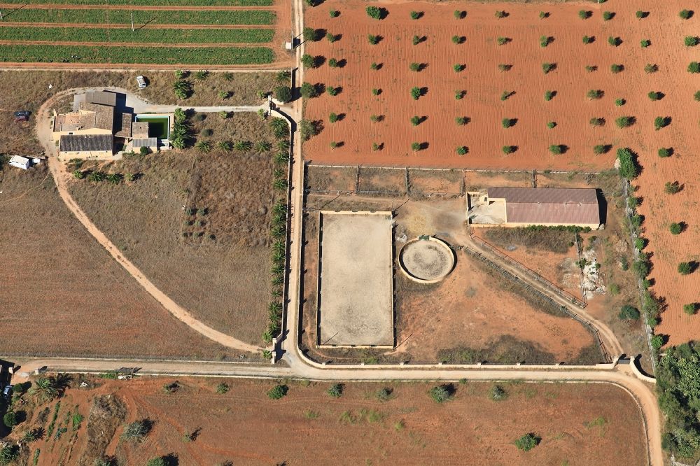 Inca from above - Structures on agricultural fields after the harvest at Inca in Mallorca in Balearic Islands, Spain