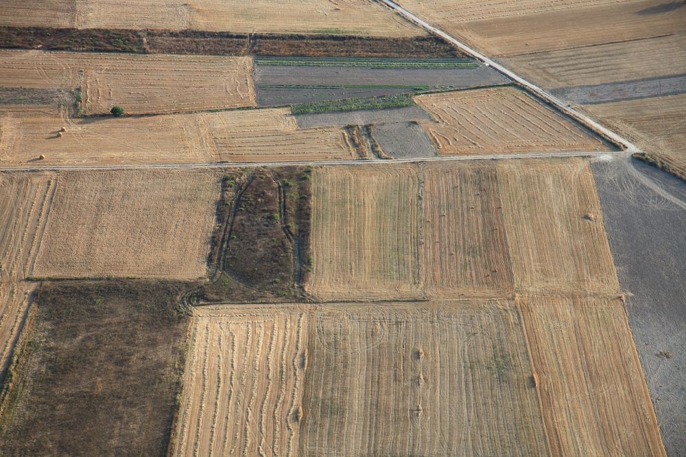 Manacor from the bird's eye view: Structures on agricultural fields after the harvest at Manacor in Mallorca in Balearic Islands, Spain