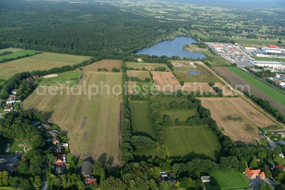 Aerial photograph Aurich - Structures on agricultural fields near the industrial estate Sandhorst in Aurich in the state Lower Saxony