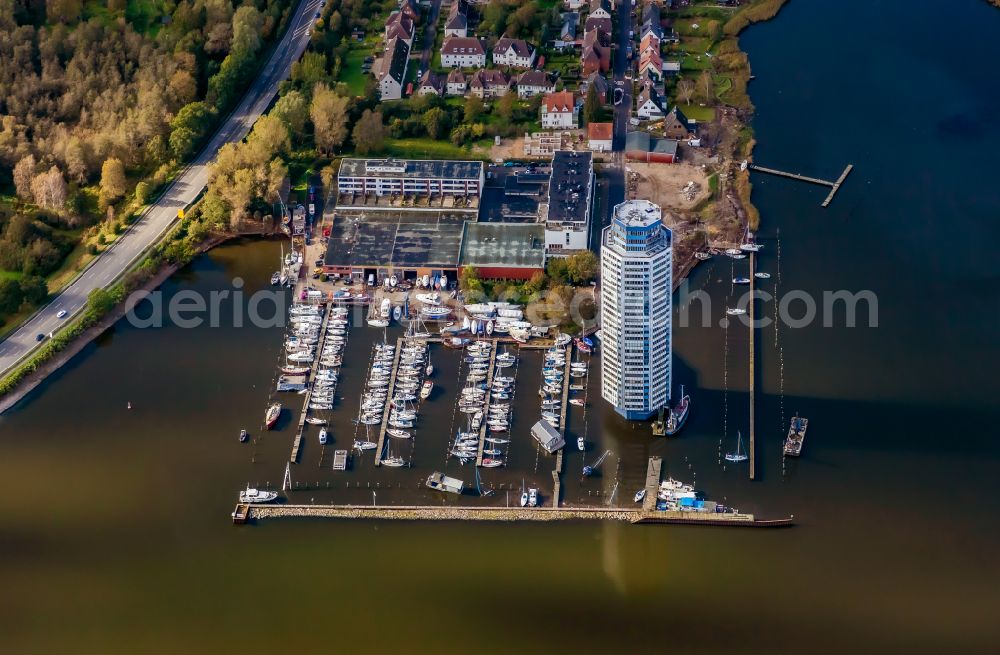 Schleswig from the bird's eye view: Storm damage on the pleasure boat and sailboat pier and boat berths in the harbor at the high-rise Wikingturm on the street Wikingeck in the Anttenhoeh district in Schleswig in the state Schleswig-Holstein, Germany