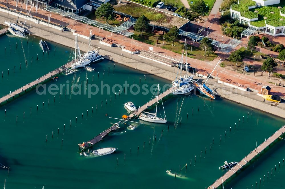 Aerial image Ostseebad Damp - Storm damage to the pleasure boat and sailboat pier and boat berths in the harbor Yachthafen Damp on the street Zur Niebymole in Ostseebad Damp in the state Schleswig-Holstein, Germany