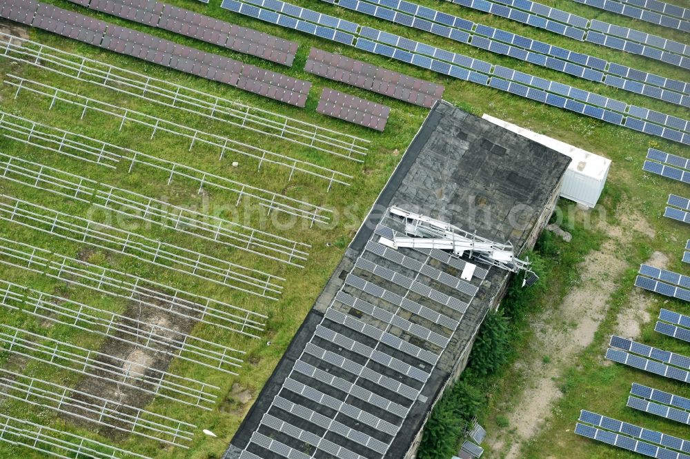 Aerial image Magdeburg - Storm damage in photovoltaic panel rows of the solar park or solar power plant in the district Gewerbegebiet Nord in Magdeburg in the state Saxony-Anhalt, Germany