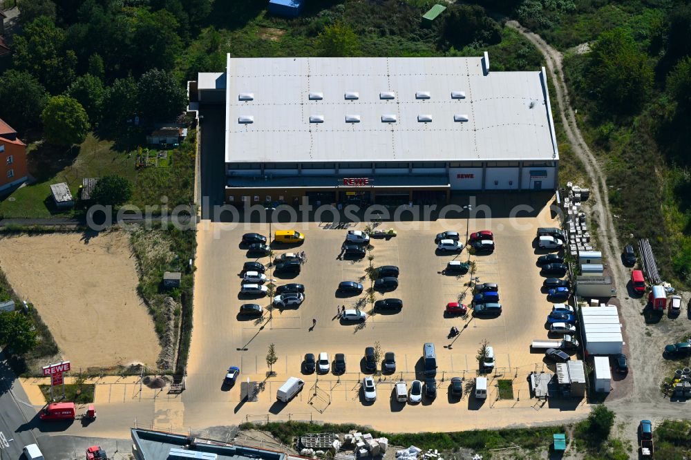 Aerial photograph Caputh - Store of the Supermarket REWE on street Kirschanger in Caputh in the state Brandenburg, Germany
