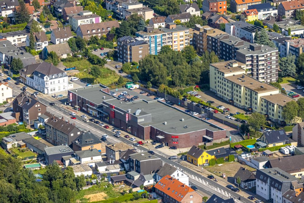 Aerial photograph Bochum - Store of the Supermarket REWE on street Wattenscheider Hellweg in the district Hoentrop in Bochum at Ruhrgebiet in the state North Rhine-Westphalia, Germany