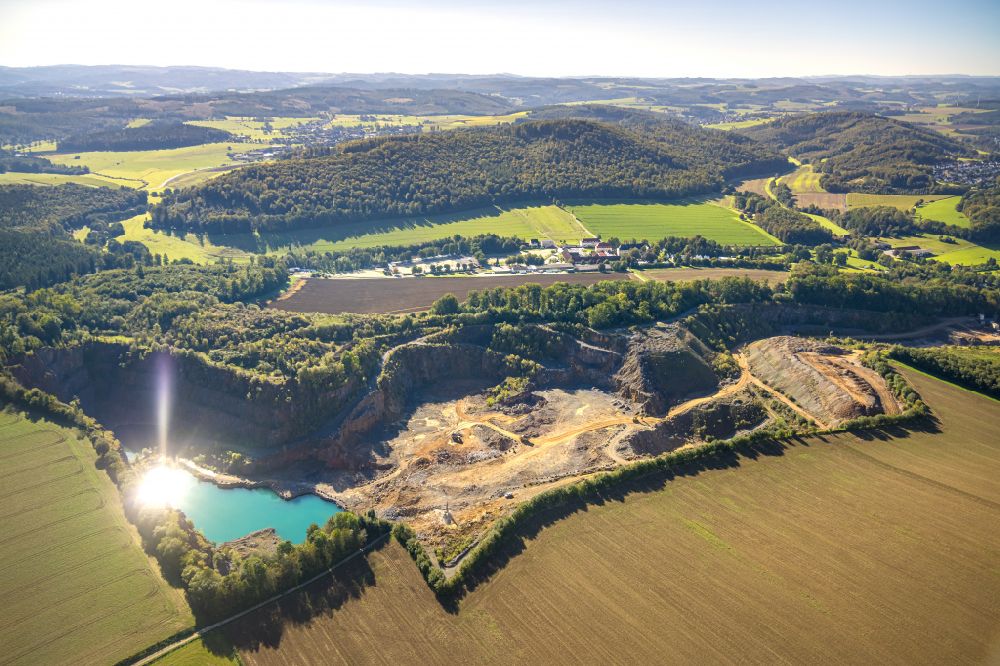 Beckum from the bird's eye view: Terrain and overburden areas of the opencast mine Beckumer Tagebau in Beckum in the state North Rhine-Westphalia, Germany
