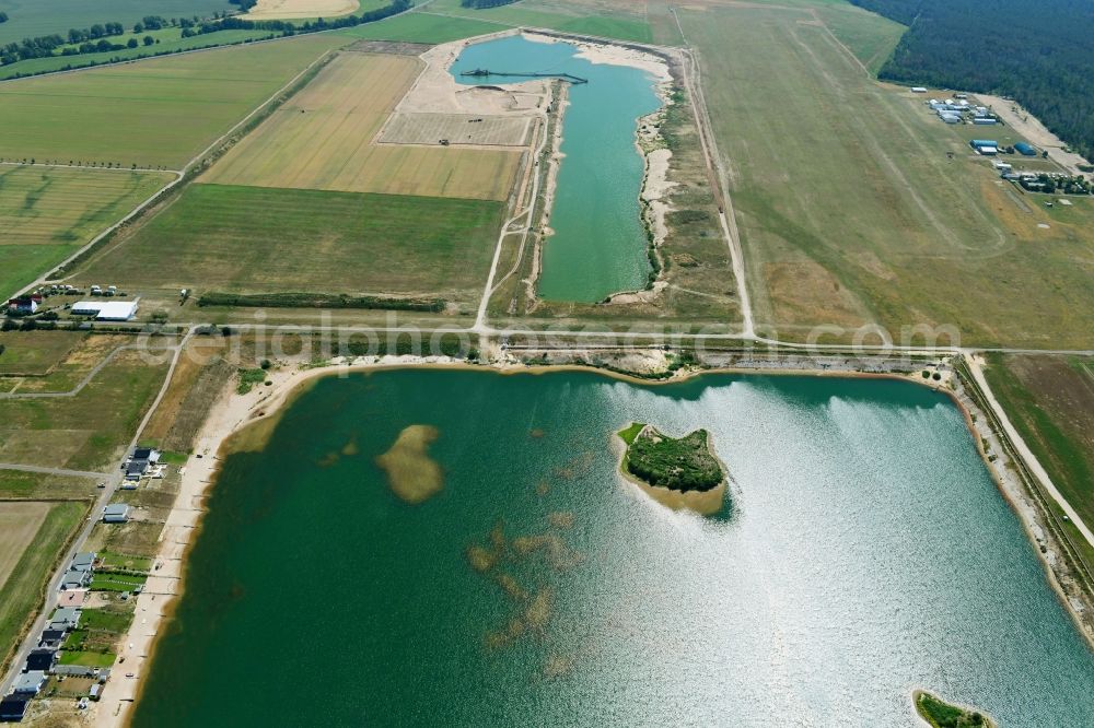 Aerial photograph Löbnitz - Open pit re cultivation on the shores of the lake Muehlfeldsee and Seelhausener See in Loebnitz in the state Saxony, Germany