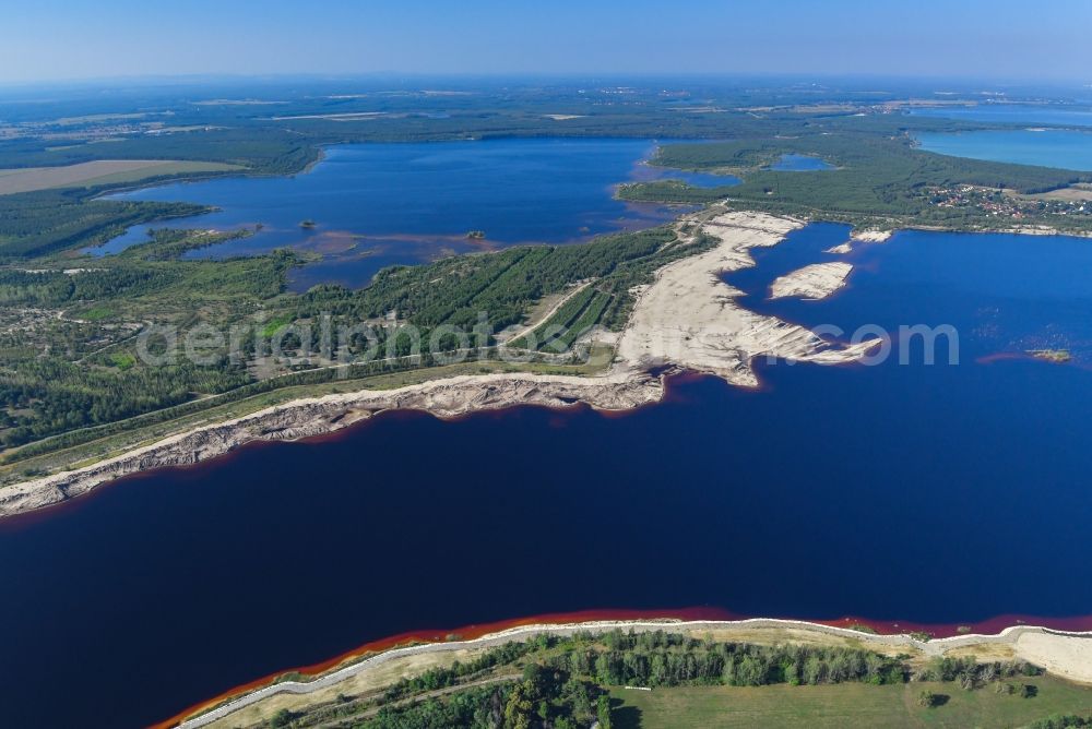 Klein Partwitz from the bird's eye view: Open pit re cultivation on the shores of the lake Blunoer See in Klein Partwitz in the state Saxony, Germany