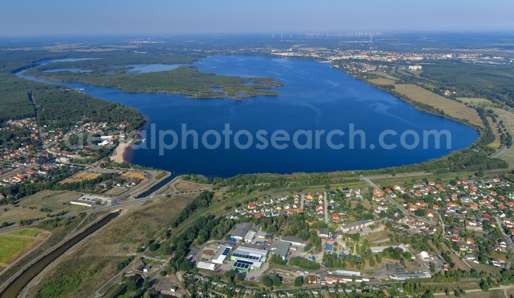 Aerial image Senftenberg - Open pit re cultivation on the shores of the lake Senftenberger See in Senftenberg in the state Brandenburg, Germany
