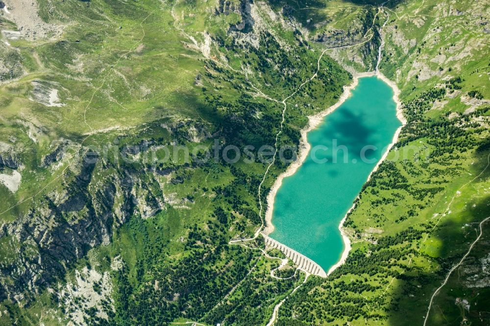 Aerial image Aussois - Dam and shore areas at the lake Lac de Plan d'Amont in Aussois in Auvergne-Rhone-Alpes, France