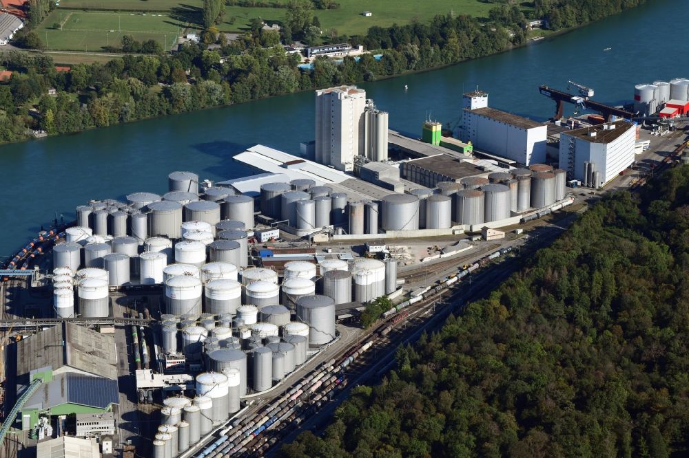 Muttenz from above - The tank farm in the Auhafen in Muttenz, Switzerland. The Rhine harbor is turnover for industry and petroleum products