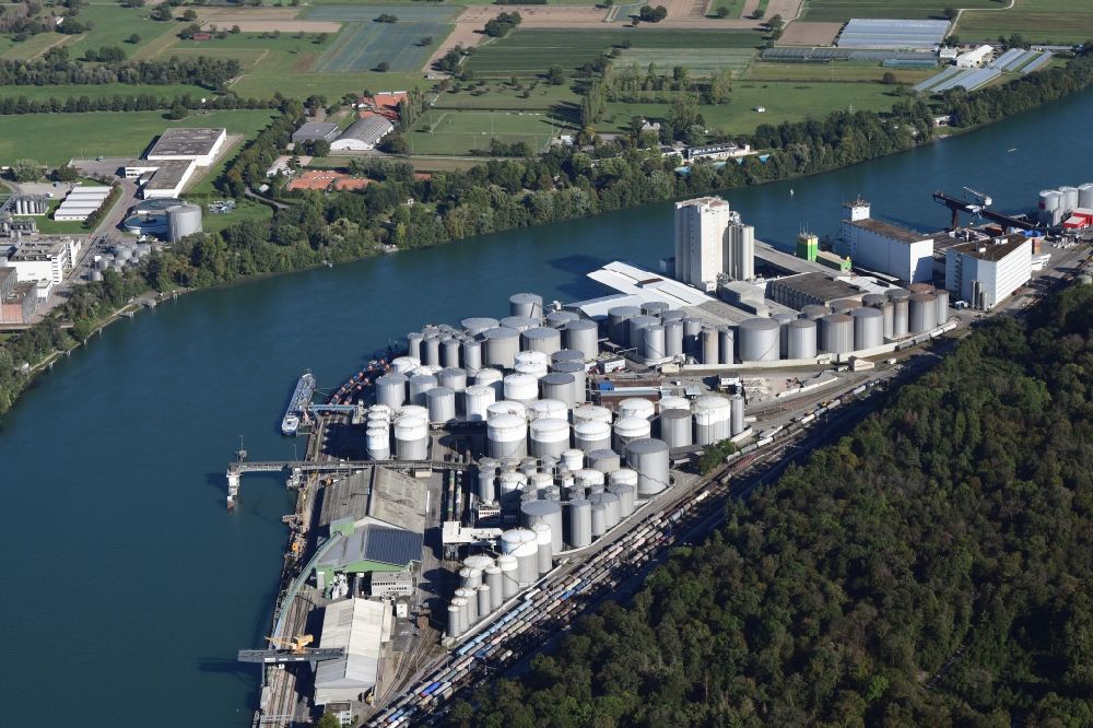 Muttenz from the bird's eye view: The tank farm in the Auhafen in Muttenz, Switzerland. The Rhine harbor is turnover for industry and petroleum products