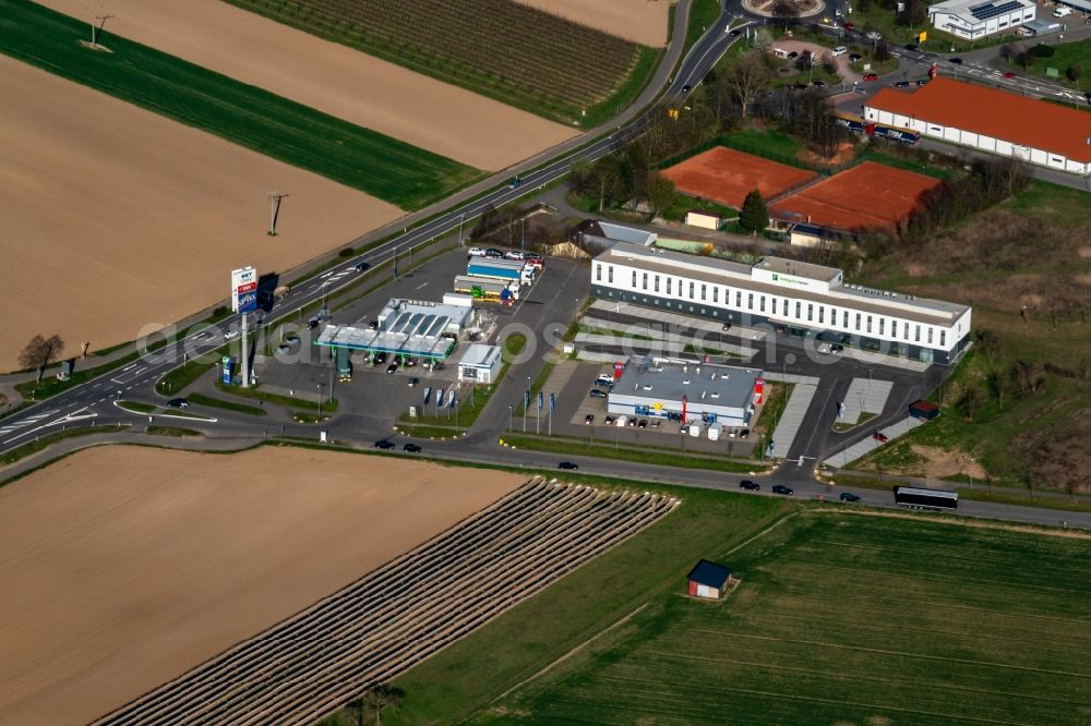 Ringsheim from the bird's eye view: Gas station for sale of petrol and diesel fuels and mineral oil trade Mit Hotel in Ringsheim in the state Baden-Wurttemberg, Germany