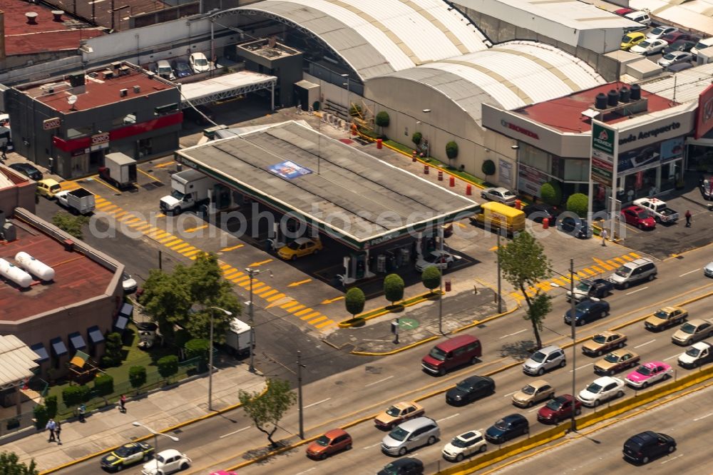 Ciudad de Mexico from the bird's eye view: Gas station for sale of petrol and diesel fuels and mineral oil trade Pemex in Ciudad de Mexico in Mexico