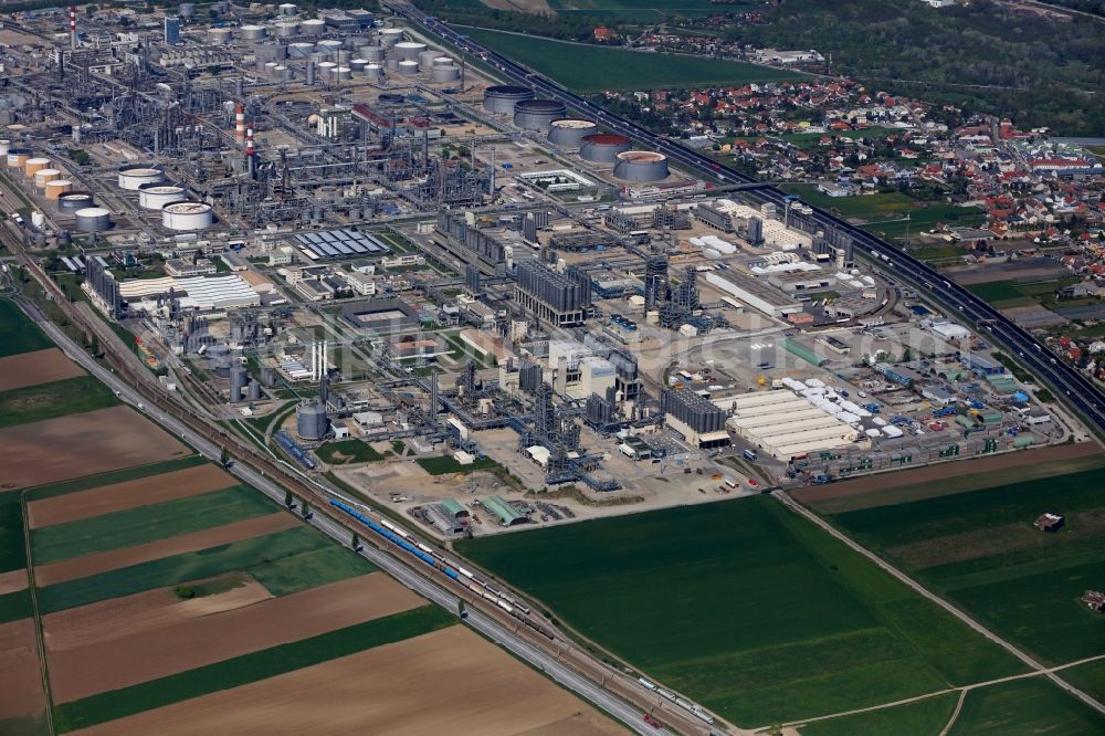 Schwechat from above - Technical facilities of Borealis and OMV refinery in the industrial area in Schwechat in Lower Austria, Austria