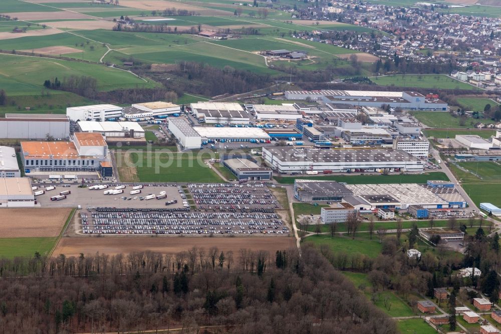 Aerial photograph Möhlin - Technical facilities in the industrial area Riburg with Rodi Fructus, Kuehne + Nagel, DPD, Galliker Transport AG and Louis Ditzler AG in Moehlin in the canton Aargau, Switzerland