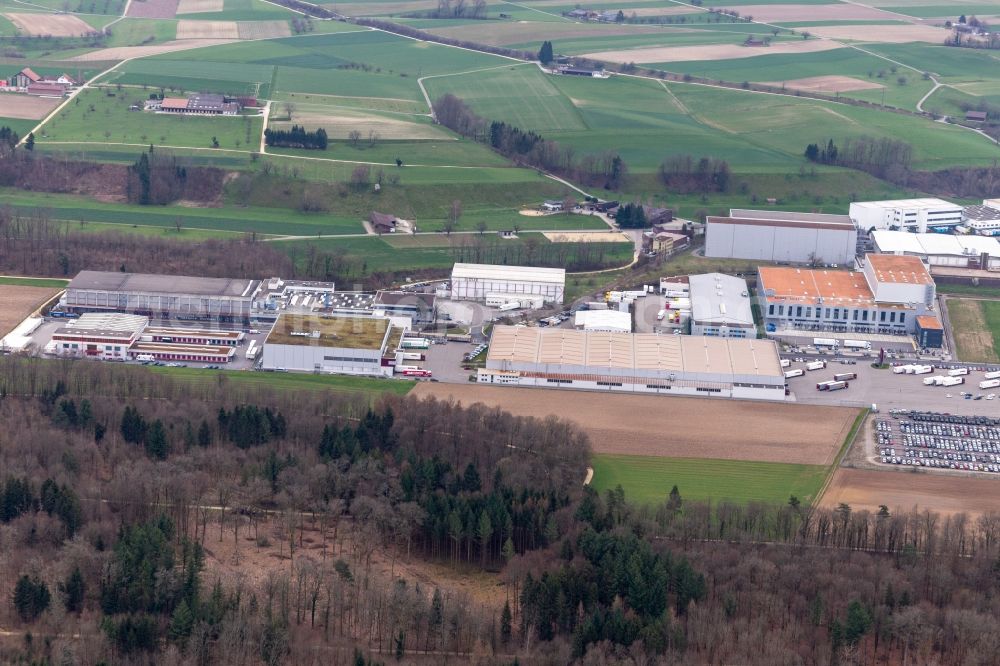 Möhlin from above - Technical facilities in the industrial area Riburg with Rodi Fructus, Kuehne + Nagel, DPD, Galliker Transport AG and Louis Ditzler AG in Moehlin in the canton Aargau, Switzerland
