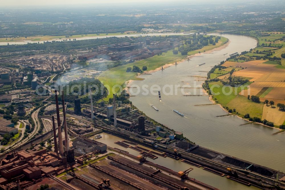 Duisburg from above - Technical equipment and production facilities of the steelworks Huettenwerke Krupp Mannesmann GmbH in Duisburg in the state North Rhine-Westphalia. In the picture the logistics company DKT Duisburg Kombiterminal GmbH