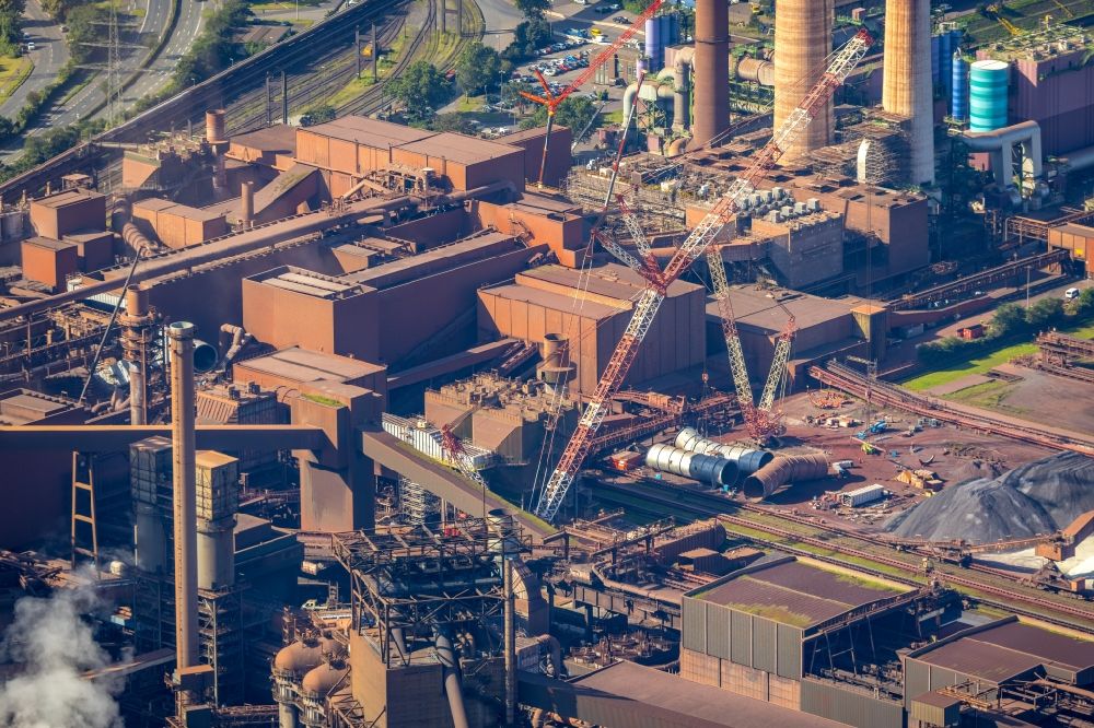 Aerial photograph Duisburg - Technical equipment and production facilities of the steelworks Schwelgern at the river course of the Rhein in Duisburg in the state North Rhine-Westphalia, Germany