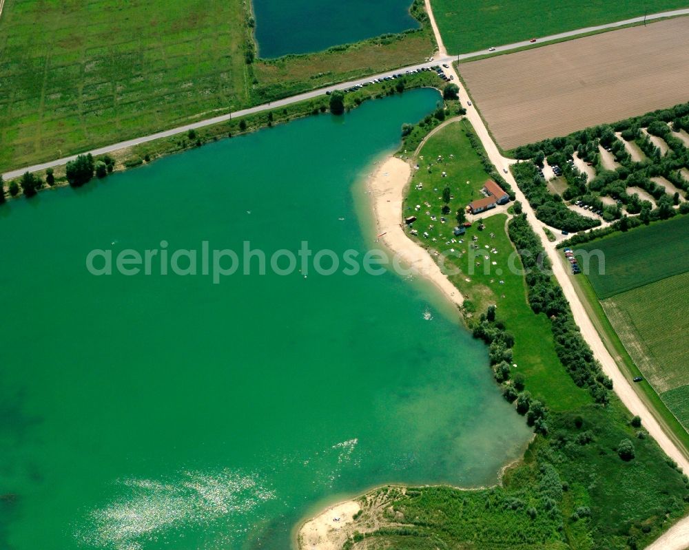 Kößnach from the bird's eye view: Water area and pond oasis Weiher 12 with nudist beach in Koessnach in the state Bavaria, Germany