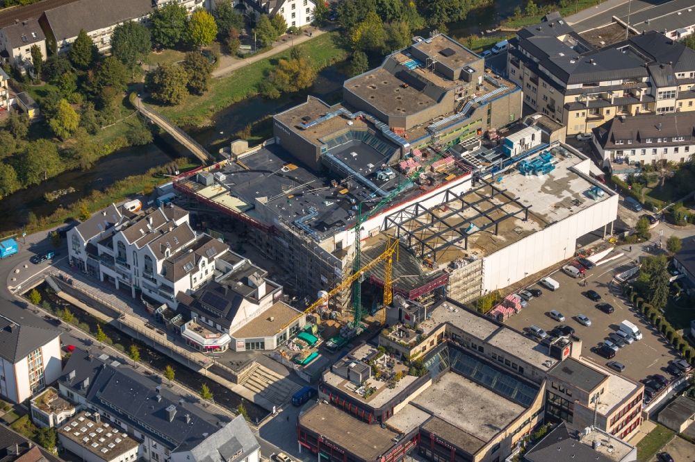 Meschede from above - Partial demolition and reconstruction of the former department store building HERTIE on Winziger Platz in Meschede in the state North Rhine-Westphalia, Germany
