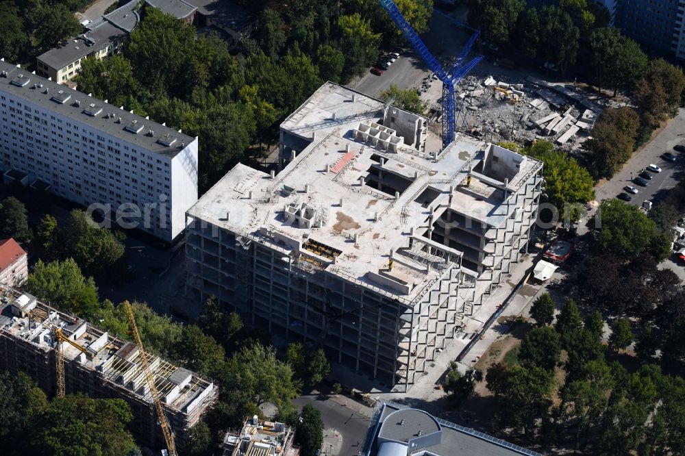 Aerial photograph Berlin - Partial demolition and reconstruction of the former department store building Kaufhof - Centrum Warenhaus on Hermann-Stoehr-Platz - Koppenstrasse in the district Friedrichshain in Berlin, Germany