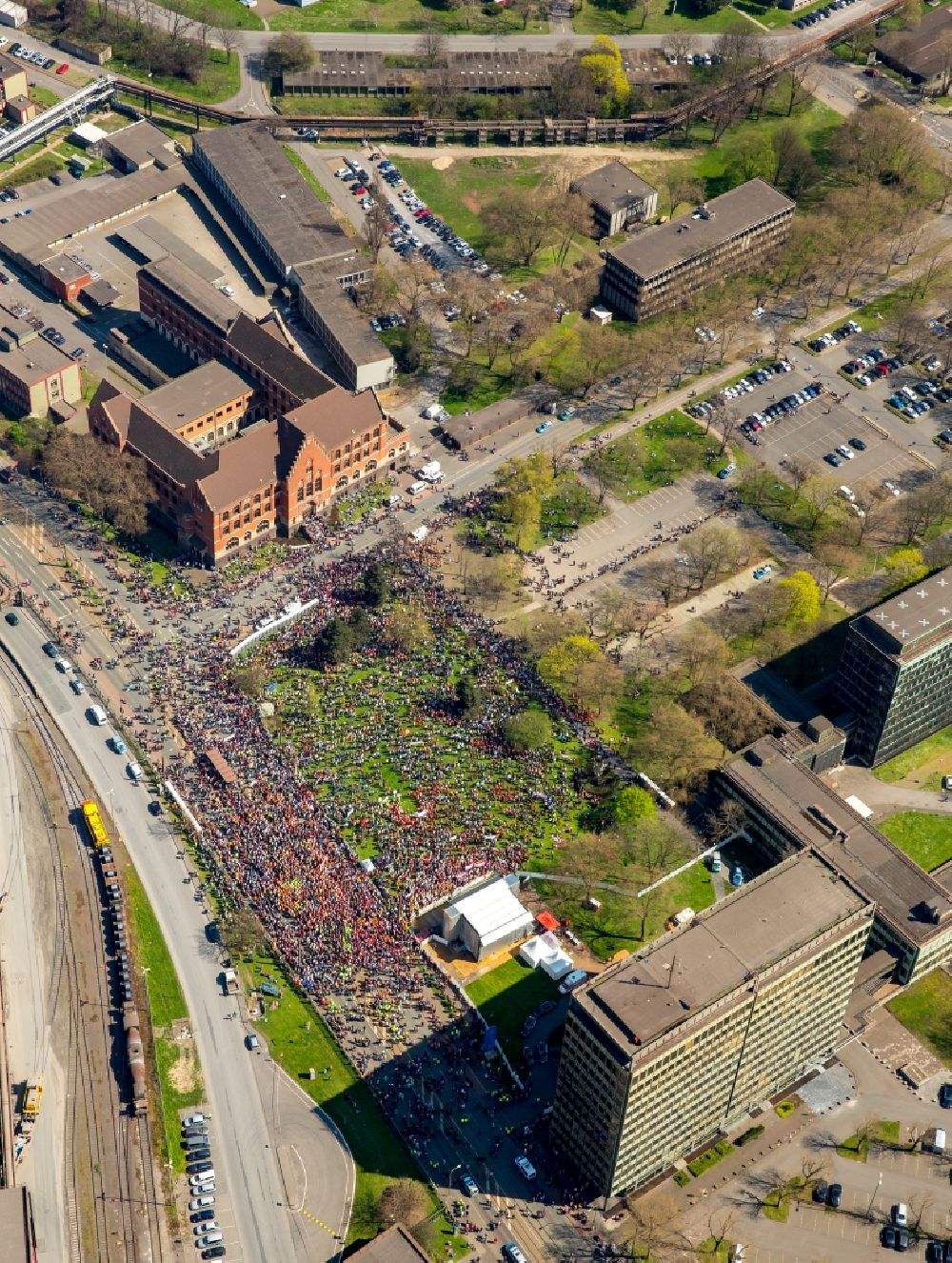 Duisburg from the bird's eye view: Participants in a demonstration for steel action of IG Metall in front of the Thyssen Krupp Steel headquarters in Duisburg in North Rhine -Westphalia