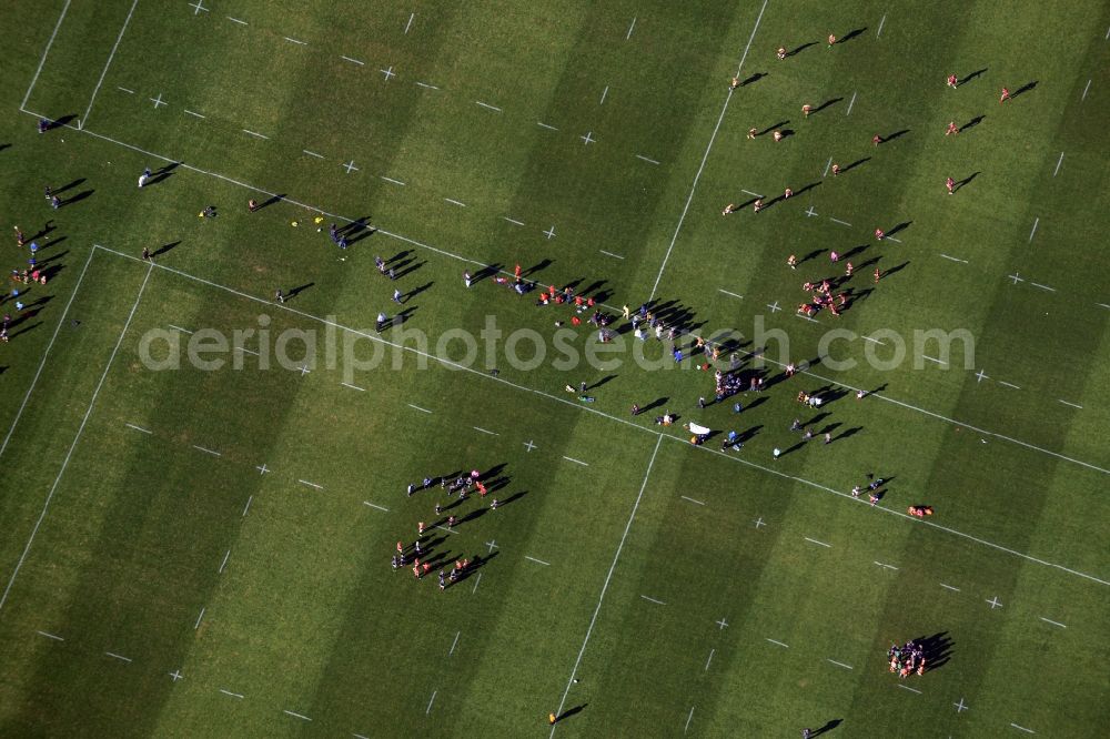 Aerial image Berlin - Participants of the sports event of the Berliner Rugby Club eV on the sports field Glockenturmstrasse on Maifeld in Berlin