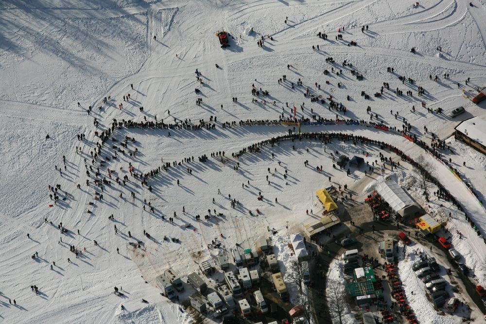 Todtmoos from above - Participants and spectators of the sporting event sled dog race at the event area in the district Schwarzenbach in Todtmoos in the state Baden-Wuerttemberg