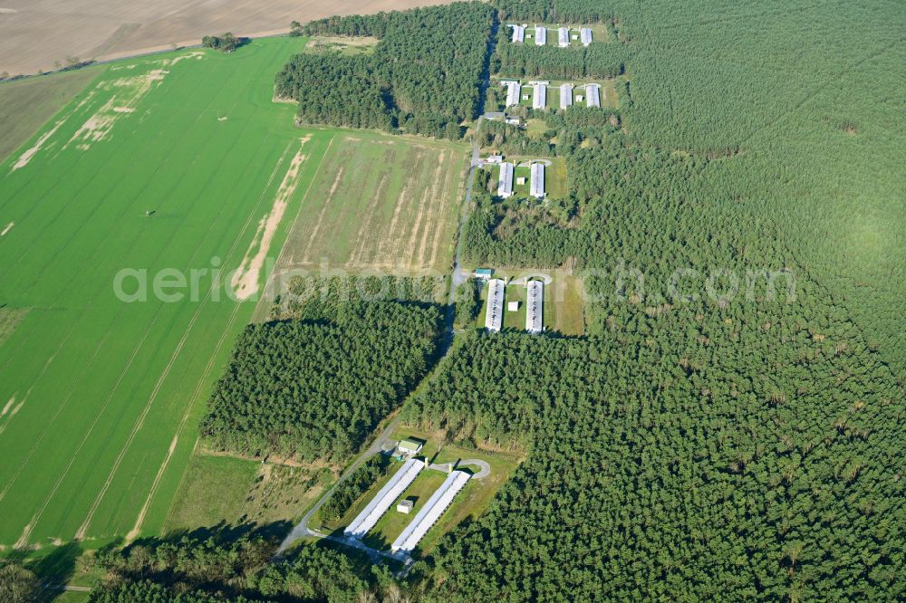 Rägelin from the bird's eye view: Stalled equipment for poultry farming and poultry production in Raegelin in the state Brandenburg, Germany