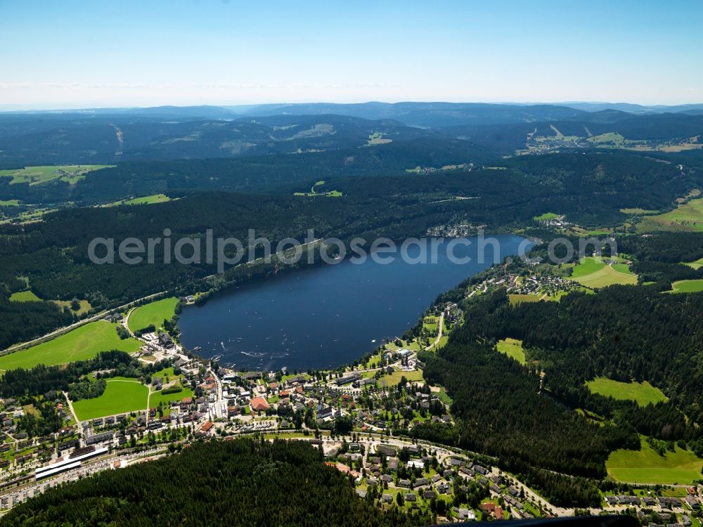 Titisee-Neustadt from the bird's eye view: Lake Titisee in Neustadt in the state of Baden-Wuerttemberg. The lake was created by the Feldberggletscher glacier and is located in the Southern Black Forest. The Titisee part of the town of Titisee-Neustadt is located on its Northern shore. It is well known for its diverse population of fishes