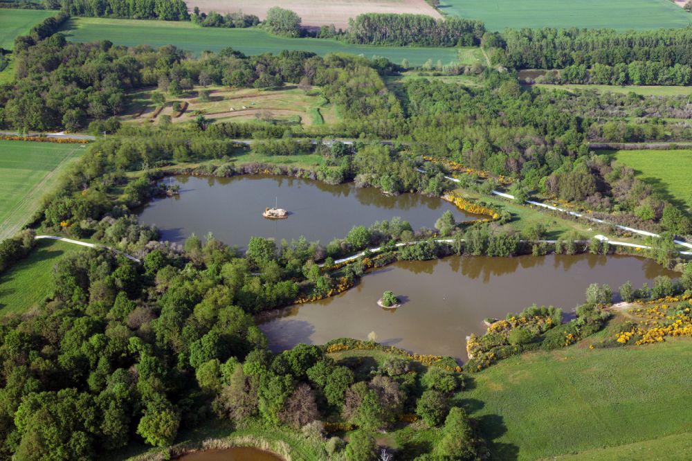 Aerial image Sully-sur-Loire - Pond water surface and pond oasis in Sully-sur-Loire in Centre, France