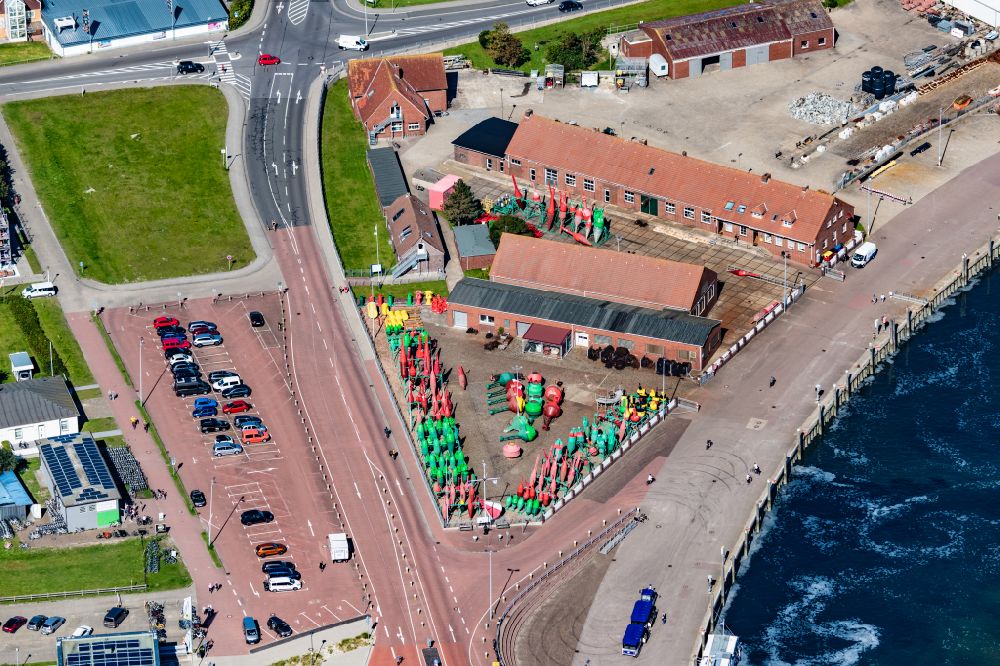 Aerial image Norderney - At the barrel yard, barrels (seamarks) are processed and brought back into the mudflats on the island of Norderney in the state of Lower Saxony, Germany