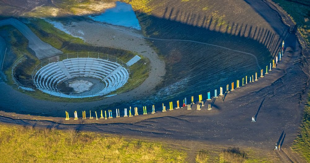 Aerial image Bottrop - Brightly colored totems on the plateau of the Monte Schlacko site on a hill of the former mining dump Haniel in Bottrop in the Ruhr area in the state of North Rhine-Westphalia