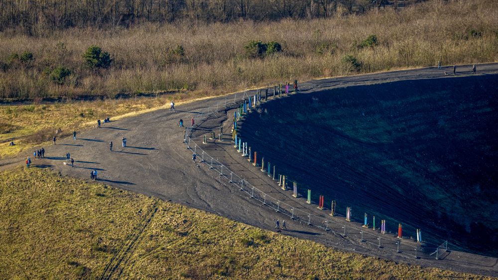 Aerial image Bottrop - Brightly colored totems on the plateau of the Monte Schlacko site on a hill of the former mining dump Haniel in Bottrop in the Ruhr area in the state of North Rhine-Westphalia