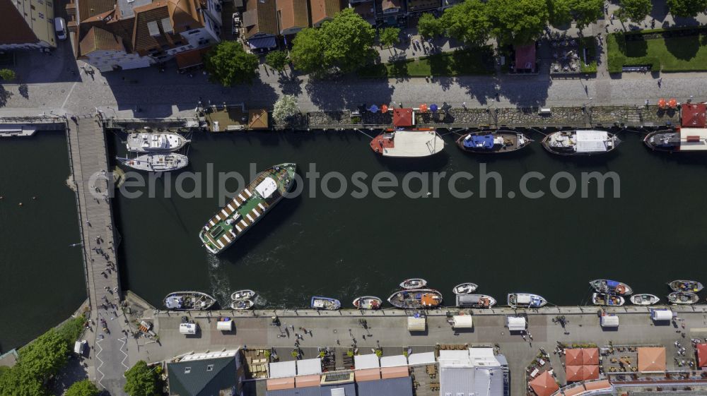 Rostock from above - Tourist attraction and sightseeing Fishing boats on the banks of Alter Strom in the district Warnemuende in Rostock in the state Mecklenburg - Western Pomerania, Germany