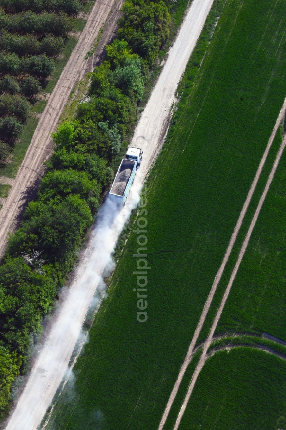 Felchta from above - Transport vehicles in agricultural fields in Felchta in the state Thuringia, Germany