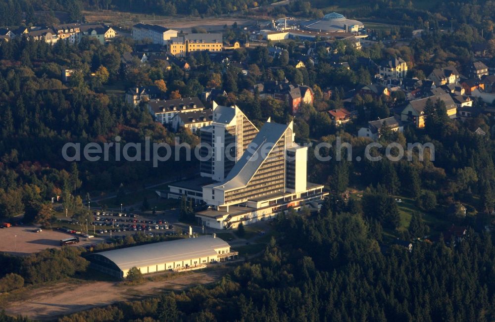 Aerial photograph Oberhof - The Treff Hotel Panorama is located high up on the wooded slopes in the Dr. Theodor-Neubauer-Strasse in Oberhof in Thuringia. This traditional hotel is the ideal location for business and leisure trips to the World Cup Biathlon place. There are places to stay in different classifications as well as extensive sports, entertainment and spa facilities