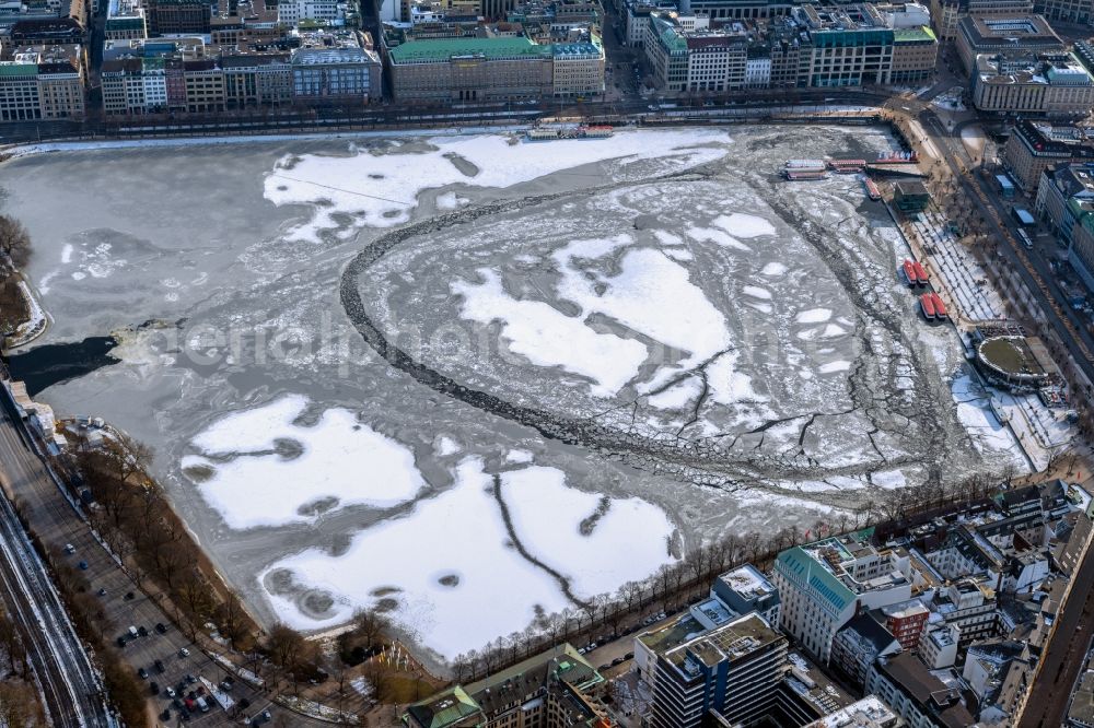 Hamburg from above - Ice floe pieces of a drift ice layer on the water surface of the Binnenalster in the district Neustadt in Hamburg, Germany