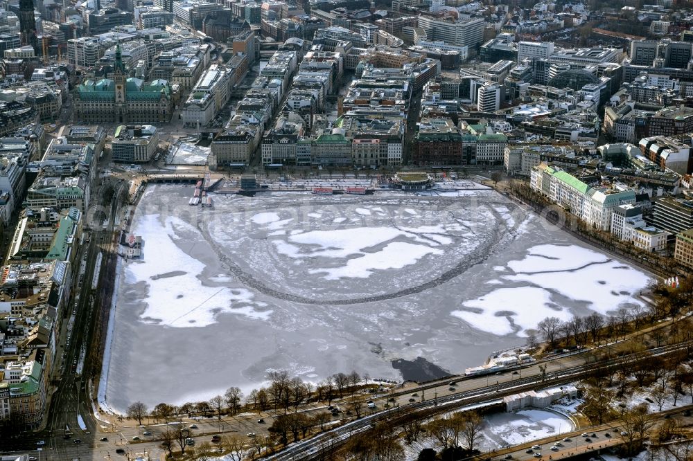 Hamburg from the bird's eye view: Ice floe pieces of a drift ice layer on the water surface of the Binnenalster in the district Neustadt in Hamburg, Germany
