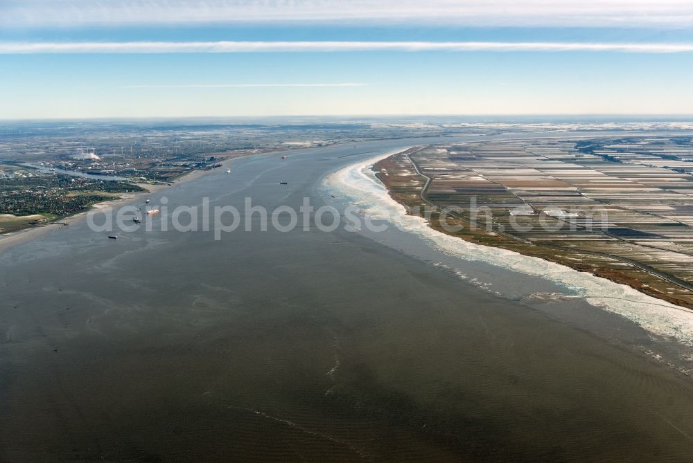 Aerial photograph Brunsbüttel - Ice floe pieces of a drift ice layer on the water surface auf of Elbe in Brunsbuettel in the state Lower Saxony, Germany
