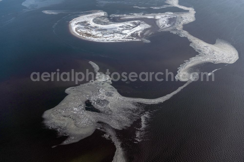 Aerial image Butjadingen - Ice floe pieces of a drift ice layer on the water surface in the North Sea in Butjadingen in the state Lower Saxony, Germany
