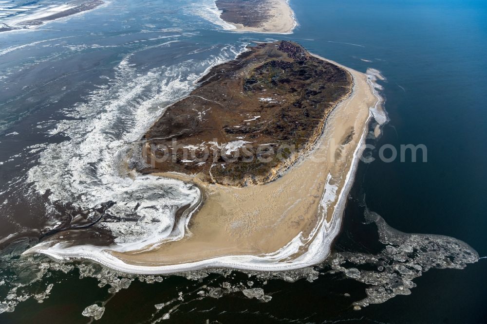 Aerial photograph Baltrum - Ice floe pieces of a drift ice layer on the water surface vor of Nordsee- Insel Baltrum in the state Lower Saxony, Germany
