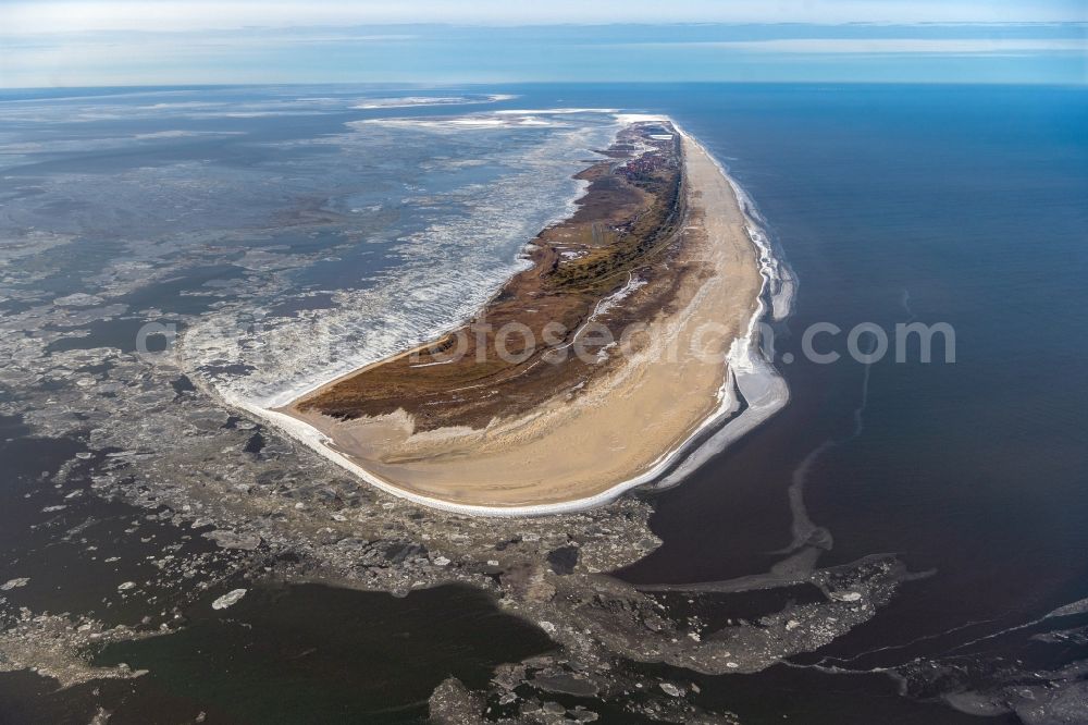 Juist from the bird's eye view: Ice floe pieces of a drift ice layer on the water surface vor of Nordsee- Island in Juist in the state Lower Saxony, Germany