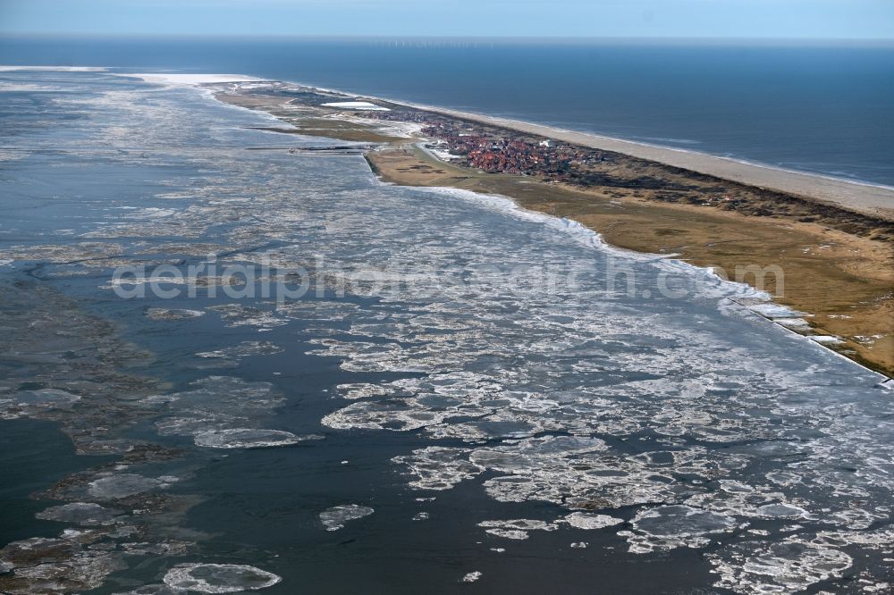 Juist from the bird's eye view: Ice floe pieces of a drift ice layer on the water surface vor of Nordsee- Island Juist in the state Lower Saxony, Germany